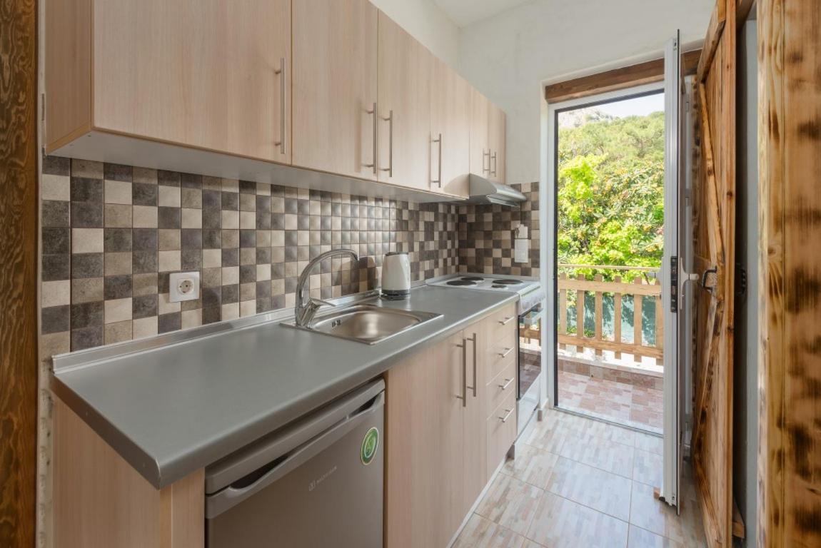 Christos Studios And Family Apartments Stegna Zimmer foto